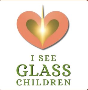Red heart with yellow light in the centre. Text: 'i see glass children'