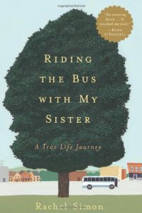 Book cover of 'Riding the Bus with My Sister: A True Life Journey' by Rachel Simon. A large tree dominates the center, with the title and author's name written on it. At the top right, there's a quote from Rosie O'Donnell: 'An amazing book. It touched my soul.' Below the tree, an illustrated bus and buildings appear in the background.