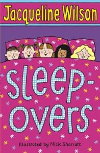 Book cover showing five smiling children peeking over a purple duvet decorated with stars. The title is written in a playful font below them.