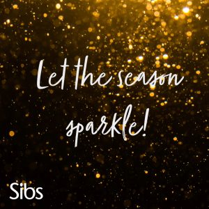 Xmas card: Dark background with golden sparkles