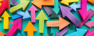 Lots of colourful arrows point in many different directions on a blue background