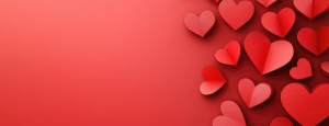 Red paper hearts are scattered to the right hand side of a red background